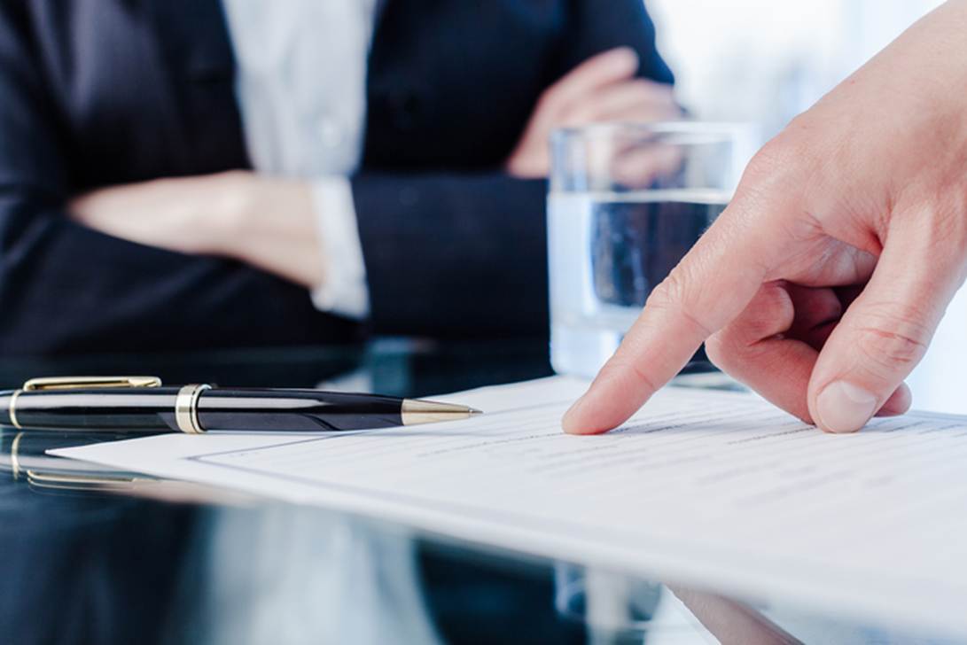 A finger pointing at a paper

AI-generated content may be incorrect.